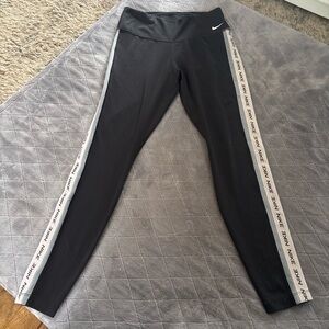 Nike Black Leggings with White Side Stripes women’s size small
